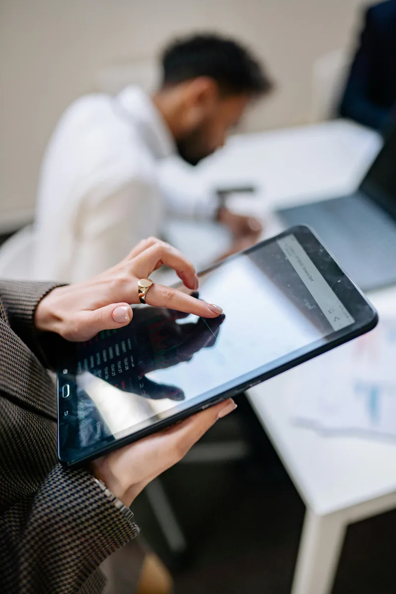 Adviser reviewing financial documents as part of a coordinated wealth review.